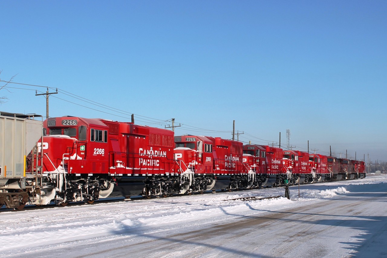 Having started to go stir crazy and with the promise of sunshine I thought my first lineside trip of the year was in order. Arriving at Woodstock CP Yard the sun had created fog which restricted visibility to about 50 metres. I was just questioning my decision, when at 9:30 the fog suddenly disappeared and 13 minutes later an eastbound with 8 locos came through. CP 9351,9784,8649 AND 2265 to 2269. I had not seen any of the locos previously!