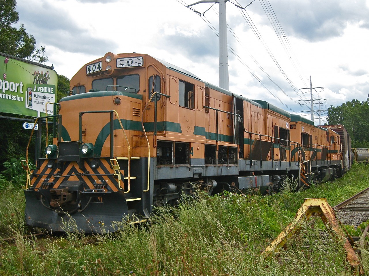 A pair of baby boats. RTEX 404 & RTEX 407 (originally Maine Central 404 & 407) were two U18B's which were in the deadline at CAD in Lachine for many years. They have since been scrapped. For more train photos, click here.