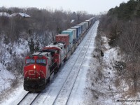 The only of the 2 eastbounds of the day pass thru Hilda bridge at mile 20 of the York subdivision with a cowl trailing. 
