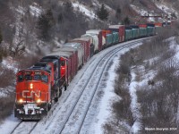 A very pleasant end of the day surprise by mile 20 of the York subdivision, a common spot among railfans in the area, a SD40-2(W) leads a main mixed freight train towards Macmillan yard!