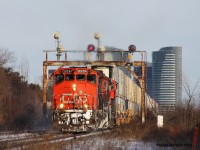 CN 9524, a zebra striped Geep leads CN 121 through Thornhill with CN units 2100 & 8955 trailing. The train is almost at its destination in Brampton Intermodal Terminal, passing the clear signal on the approach to Snider as it goes. The location is new and I hope to visit it again sometime soon! Also, thanks to Railpictures.Ca contributor Michael Delic for the heads up on this one!