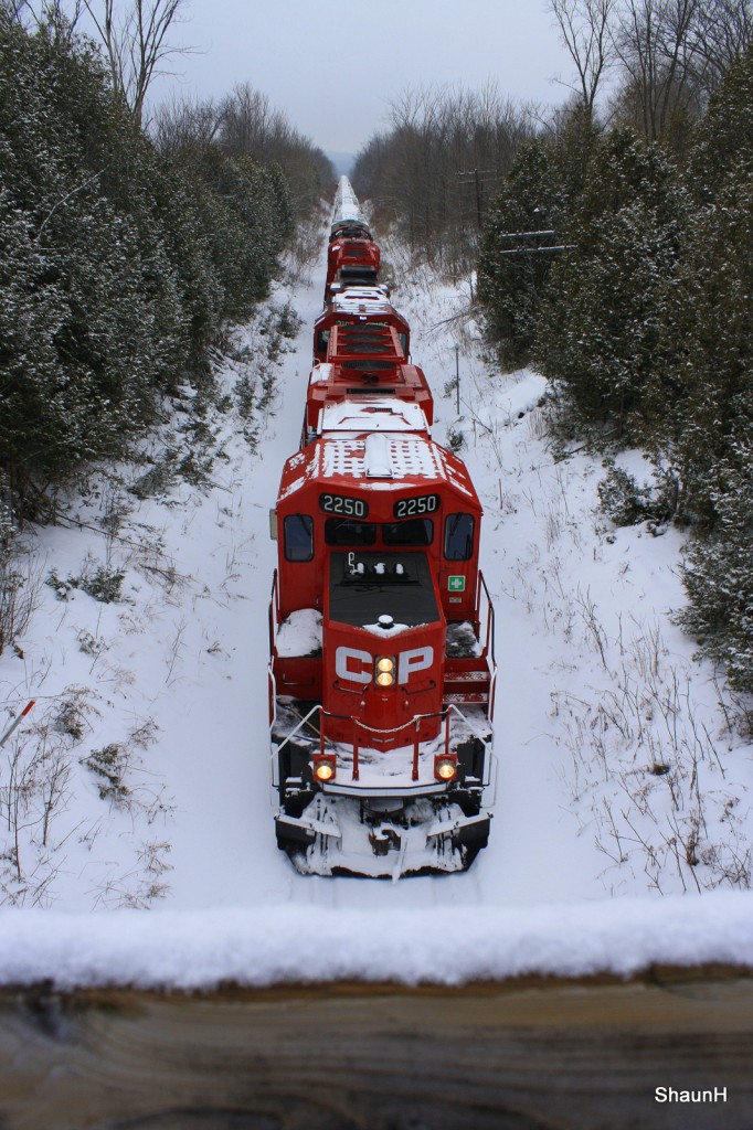 CP T08 cuts through fresh snow on its way eastward to Havelock yard