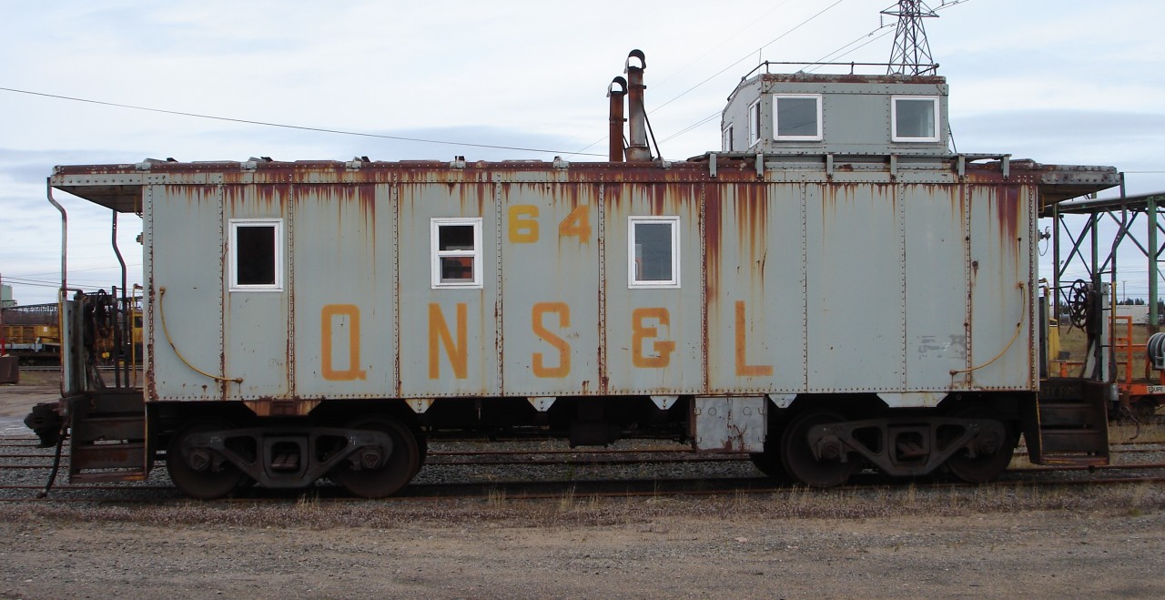 Who knows what kinds of ghosts and goblins are lurking inside this classic steel caboose that was captured on Halloween at the QNS&L car and locomotive facility in Sept-Iles.  The thermo pane windows and dual stoves will certainly help keep this van warm inside during the harsh winter months that are just around the corner.