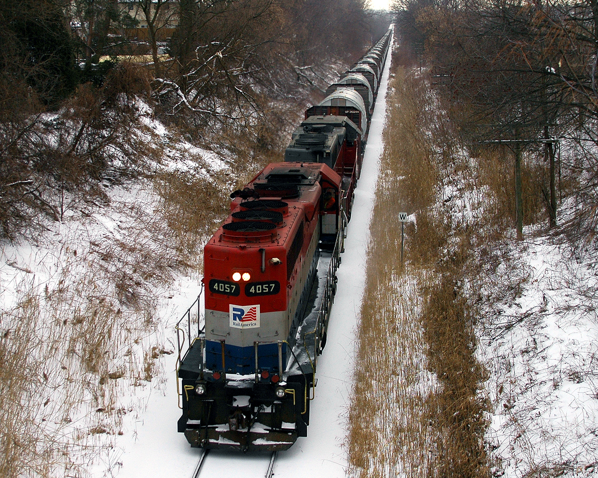 An SOR Extra rumbles down the Hagersville sub with RLK 4057 - NECR 3840, and 52 cars of windmill parts.