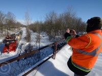 Brad Jolliffe - Ontario Southland Railway General Manager and one of two men in the plows cab has posed his train under the CASO bridge telltale for a photo.  At right is the former CNR Burford sub. Search any of the photos on railpictures.ca of OSR 2014 plow runs, and Brad has been in the cab on all - such as this great action shot by James Gardiner: <a href=http://www.railpictures.ca/?attachment_id=13300>http://www.railpictures.ca/?attachment_id=13300</a>