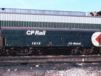 Although Robot Cars were manufactured using also coach and boxcar bodies, this is one example of only 11 Robots constructed using a locomotive shell.(#'s 1006-1016) The 1013 was the former CP 4457. This is a system in which a control car located usually just ahead of mid-train away from direct MU control can be controlled by the engineer in the lead consist. This was accomplished using radio signals. The 1013 housed radio equipment and data processing equipment to communicate between lead units and mid-train slaves. This particular unit went into operation Oct. 1972. By 1983, what is now known as Locotrol equipment was put into the noses of newer SD40-2s. The system was vital for running heavier trains thru the mountains of the West. I've no information as to when 1013 and the others of its kind left the CP roster, but I suspect they did not survive past 1990. In essence, this method of train control was the fore-runner of todays' DPU.