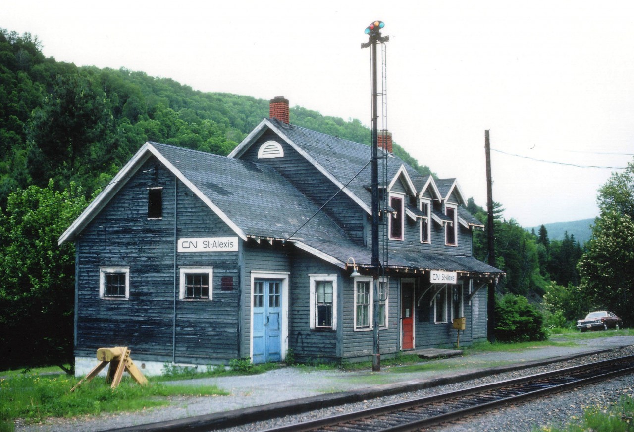 There is 'something' about these old rural stations.  Living quarters upstairs for the operator, as there is no actual settlement here. The community of St.Alexis-de-Matapedia is about 5 KM the other side of the Matapedia River. I wondered at the time I took this photo whether the structure was being used as a private residence, seeing the car parked there. Quebec's countryside used to be dotted by these little pieces of history; now most all,  I suspect, are but a memory.