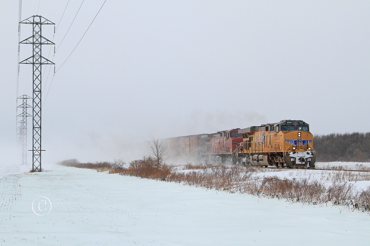 UP 5510 with CP 8642 are in charge of train 608 at mile 99 on the CP's Windsor Sub on a blustery winter day.