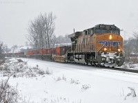 UP 5522 leads CP train 118 past the Cherrywood siding as the snow begins to fall. With the UP 5312 in DPU mode on the rear end, this train has an all Union Pacific set of power. Ghosts of the UP ALCO FA's that CP leased in the early 1960's. 1607hrs.