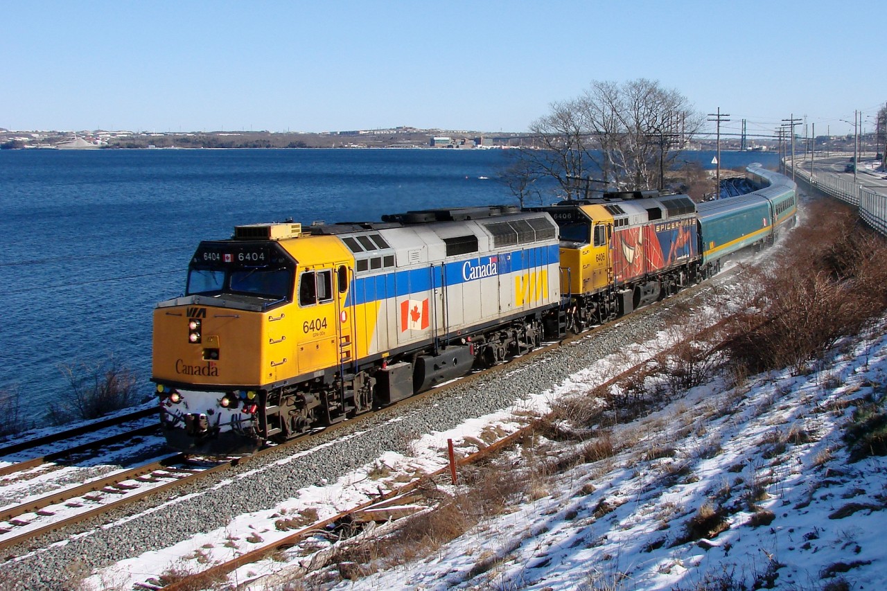 VIA's westbound Ocean makes its way along the shores of Bedford Basin as it clears the west end of Rockingham Yard and approaches mile 7 on CN's Bedford Sub.