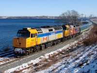 VIA's westbound Ocean makes its way along the shores of Bedford Basin as it clears the west end of Rockingham Yard and approaches mile 7 on CN's Bedford Sub.
