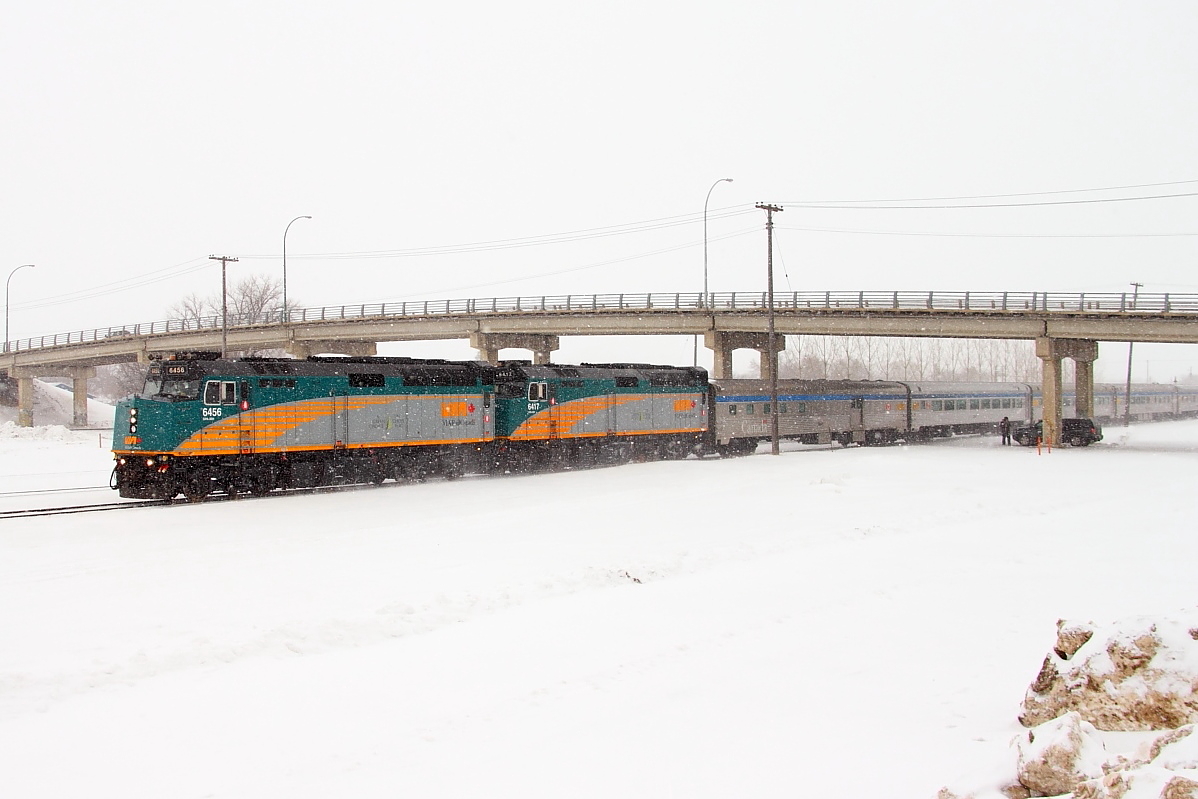 VIA's 693 Winnipeg to Churchill train passes under the Tupper Street overpass as it makes it's way towards the junction at Kearns.
