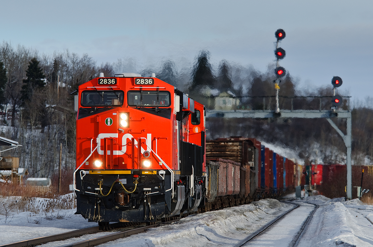 After meeting 5 westbounds (Q112, M302, U724, A412 and M310) on the double track between Carvel and Wabamun, Gary (Kirk Yard), IN - Prince George, BC train M34791 14 gets back on the move behind a pair of brand new CN ES44ACs, 2836 and 2848.