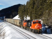 North Vancouver, BC - Allan Mines, SK potash empties (Train B75851 17) depart the north track at Wynd behind a new CN ES44AC.