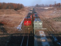 During a working vacation to Kitchener, Ontario, I managed to make several trips trackside. During one of these outings, I made the run down to the Paris area to see what I could find. This was my final catch of the day as two CN trains performed an ideal meet at West Paris.