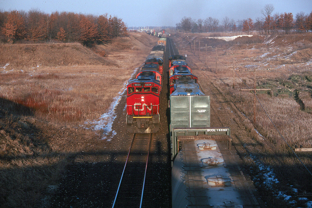 During a working vacation to Kitchener, Ontario, I managed to make several trips trackside. During one of these outings, I made the run down to the Paris area to see what I could find. This was my final catch of the day as two CN trains performed an ideal meet at West Paris.