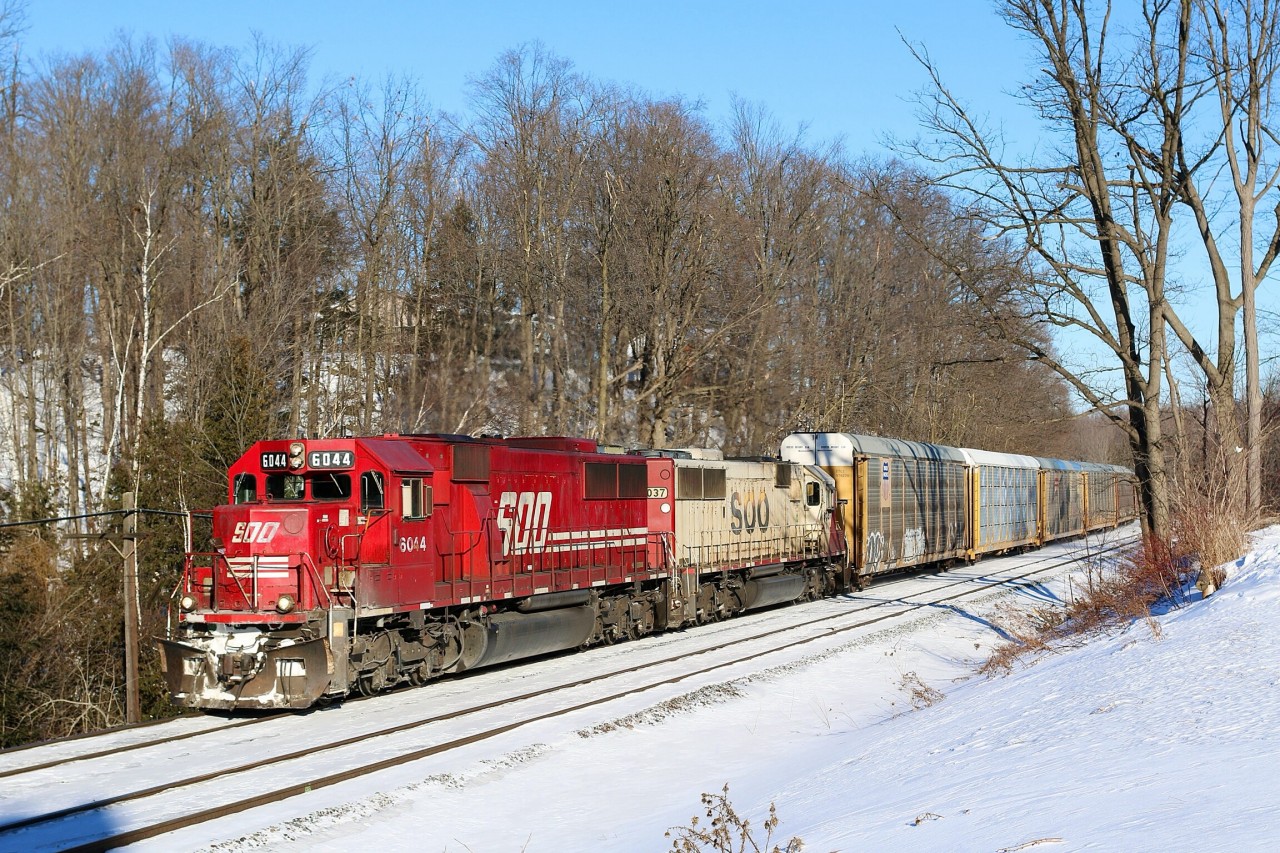 In 2014 it is hard enough to find one SOO Line painted unit in a lash up but finding two is quite rare. Over the past few years CP has been busy shipping SOOs SD60s off to CAD Rail in Quebec for overhauls and repainting. With only a handful left to do in 2013 the program was haulted and the SD60s were stored and put up for sale. It seems there has been a change of heart and most are now active again including a few that were never rebuilt. CP train 147 if seen rolling through Campbellville with solid SOO power on a sunny but bitterly cold January day.