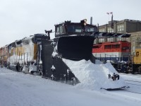 GEXR Work Plow 2303 working east past the VIA Station at Kitchener. With forecasted high winds and more snow the plow extra is working east as far as mile 49 today before returning to Stratford. 