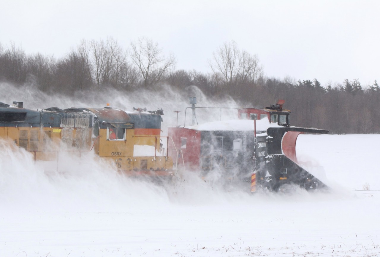 OSRs plow attacks drifts as it leaves Ingersol for St.Thomas.