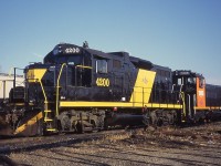 Ottawa Valley Railink 4200 and Southern Ontario Railway 1285 sit in the yard in Brantford. This was back when SOR operated the Burford Spur and did the local switching around town. 1285 was supposed to get a yellow painted cab to match the 4200's but someone read the work order wrong. 