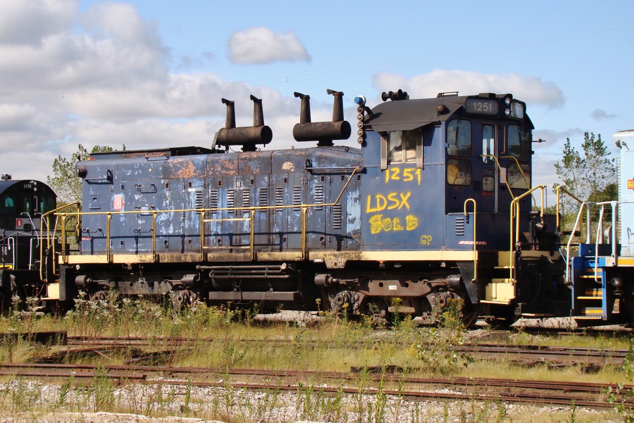 An interesting critter sits at LDS in Sarnia awaiting her fate. Looks like ex. CN