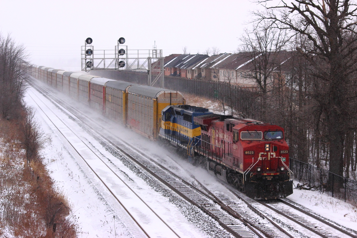 What a fantastic day on the CP Galt Subdivision today. Here we see 147 with a DME unit in second. Right behind us, CP 242 with a SOO leading awaits this train to pass before continuing on it's journey as another CP had a timed out crew and was blocking one track. With me were a few friends including railfan and friend, Warren Schlo. Thanks goes to Warren coming out and driving me here for this great shot.