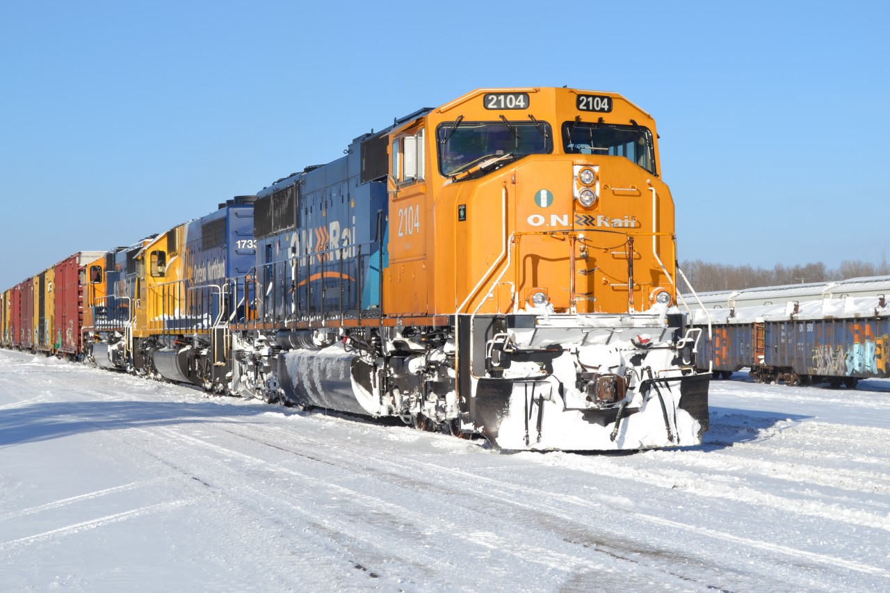 X214 prepares to leave Englehart for North Bay in the chilly winter cold. 2104 would blow it's prime mover an hour after leaving.
