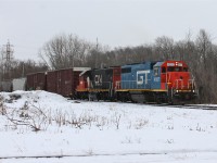 A special visitor has been hanging around the last few days... in the form of a GTW geep! Unfortunately due to my work schedule and other commitments I haven't been trackside enough to catch him but today was my chance! Not often does foreign power end up on local trains but this is proof that it does, and lucky of all of us it was leading too! 

Here we see GT 4927 and CN 4700 accelerate across the former CSX diamond at Chatham East, what a sound!