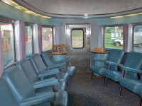 Another pic from my series on the 'Ocean Limited'. Interior view of the bullet lounge on the "Park" series dome-observation car at the end of the train. The CN line via Campbellton is in need of major repairs and so far funding has only been secured for part of the line, leaving the future of this train very much in doubt. I would recommend to those who were planning to take a trip on this train to do so sooner rather than later. 
HERE'S A TIP TO SAVE SOME MONEY for those interested in riding this train. It's a little known fact that The National Association of Railroad Passengers (NARP) offers a $35 membership card that gives a 10% discount to NARP members on all VIA & Amtrak trains. The discount was also good for my wife and on this one trip alone, the NARP discount for me & my wife paid for the card several times over. And this was on top of the 50% discount VIA had at the time! We went in sleeper class, not sure what the discount would be in coach but if you are planning more than 1 trip on VIA or Amtrak in the next year it would probably be worth it. You have to book over the phone or in person to receive the NARP discount & give your membership #. It's so little known that some VIA agents aren't aware of its existence, you can show them the details at the link below:
<a href="http://www.narprail.org/news/hotline/2208-hotline-801-march-8-2013"> http://www.narprail.org/news/hotline/2208-hotline-801-march-8-2013 </a>
For more pics & videos from my collection see <a href="http://northamericabyrail.info"> http://northamericabyrail.info </a> (new trips added)