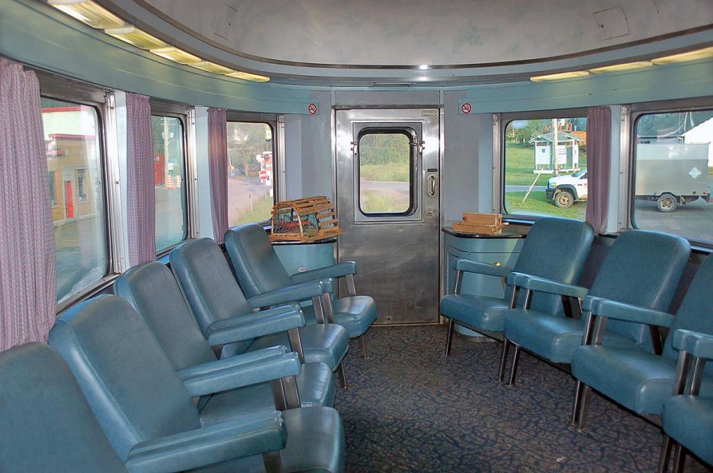 Another pic from my series on the 'Ocean Limited'. Interior view of the bullet lounge on the "Park" series dome-observation car at the end of the train. The CN line via Campbellton is in need of major repairs and so far funding has only been secured for part of the line, leaving the future of this train very much in doubt. I would recommend to those who were planning to take a trip on this train to do so sooner rather than later. 
HERE'S A TIP TO SAVE SOME MONEY for those interested in riding this train. It's a little known fact that The National Association of Railroad Passengers (NARP) offers a $35 membership card that gives a 10% discount to NARP members on all VIA & Amtrak trains. The discount was also good for my wife and on this one trip alone, the NARP discount for me & my wife paid for the card several times over. And this was on top of the 50% discount VIA had at the time! We went in sleeper class, not sure what the discount would be in coach but if you are planning more than 1 trip on VIA or Amtrak in the next year it would probably be worth it. You have to book over the phone or in person to receive the NARP discount & give your membership #. It's so little known that some VIA agents aren't aware of its existence, you can show them the details at the link below:
 http://www.narprail.org/news/hotline/2208-hotline-801-march-8-2013 
For more pics & videos from my collection see  http://northamericabyrail.info  (new trips added)