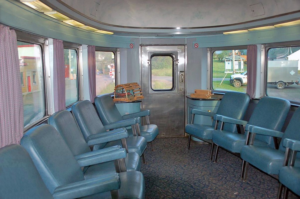 Another pic from my series on the 'Ocean Limited'. Interior view of the bullet lounge on the "Park" series dome-observation car at the end of the train. The CN line via Campbellton is in need of major repairs and so far funding has only been secured for part of the line, leaving the future of this train very much in doubt. I would recommend to those who were planning to take a trip on this train to do so sooner rather than later. 
HERE'S A TIP TO SAVE SOME MONEY for those interested in riding this train. It's a little known fact that The National Association of Railroad Passengers (NARP) offers a $35 membership card that gives a 10% discount to NARP members on all VIA & Amtrak trains. The discount was also good for my wife and on this one trip alone, the NARP discount for me & my wife paid for the card several times over. And this was on top of the 50% discount VIA had at the time! We went in sleeper class, not sure what the discount would be in coach but if you are planning more than 1 trip on VIA or Amtrak in the next year it would probably be worth it. You have to book over the phone or in person to receive the NARP discount & give your membership #. It's so little known that some VIA agents aren't aware of its existence, you can show them the details at the link below:
 http://www.narprail.org/news/hotline/2208-hotline-801-march-8-2013 
For more pics & videos from my collection see  http://northamericabyrail.info  (new trips added)