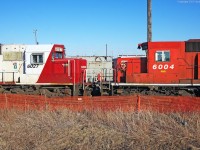 Rescued from the scrap pile SOO 6027 has recently been put back to service with CP seen alongside 6004 in Toronto yards deadline April 2013.