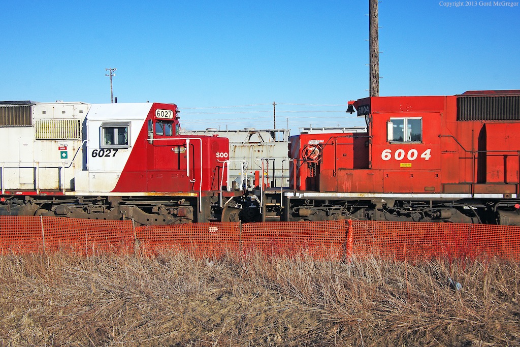 Rescued from the scrap pile SOO 6027 has recently been put back to service with CP seen alongside 6004 in Toronto yards deadline April 2013.