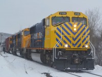 ON SD75I 2105 shows off her new look on a successful run on Freight 214 from Englehart after a year out of service due to hitting a Log truck on the Kirkland Lake Subdivision last December. The locomotive features experimental reflective striping on the new nose section in hopes of preventing future crossing accidents, as well as dawning the new "Arrow" scheme yellow.