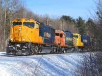 ON 2102 chrages by with freight 214 as they arrive in North Bay February 13th. 
