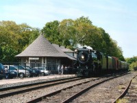 During CP's 'good-will' steam program, the CP 2816 made an appearance throughout Southern Ontario in the early summer of 2003. In this image, she is shown stopped at the old Parry Sound CP station, now renovated and born anew as a Gallery. A few fans were on hand for photos, most others were down in the dock area waiting for their chance at capturing shots of the train southbound over the popular Parry Sound trestle. At the completion of the tour, this train returned via the same route on June 22nd. Currently the locomotive is out of service, and the rumour mill says it is up for sale.