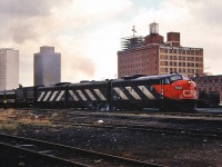 CN 6503(FP9A) is pulling out of Edmonton and heading westwards to Jasper with this trans-continental passenger train. Don't know if this train had a particular name back in 1973.