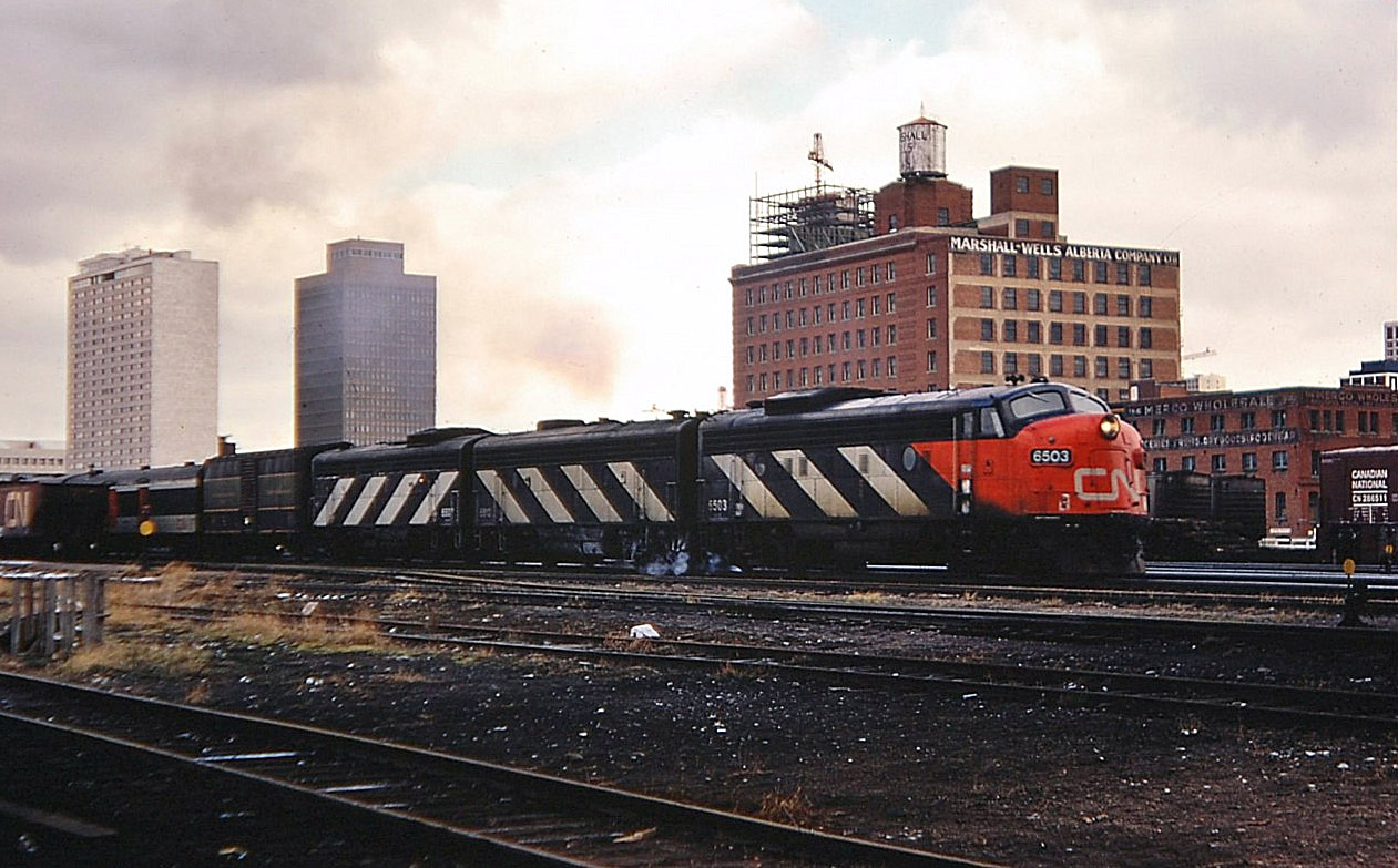 CN 6503(FP9A) is pulling out of Edmonton and heading westwards to Jasper with this trans-continental passenger train. Don't know if this train had a particular name back in 1973.