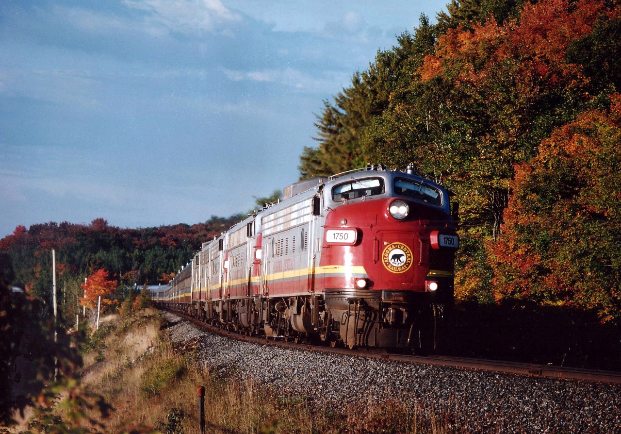 Algoma Central Agawa Canyon Tour Train racing northward just past mile 14 on a beautiful early sunlit morning. Power is AC 1750, 1756, 1754,1755 and 1751. I believe all these x-CN/VIA units now reside Stateside.