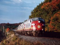 Algoma Central Agawa Canyon Tour Train racing northward just past mile 14 on a beautiful early sunlit morning. Power is AC 1750, 1756, 1754,1755 and 1751. I believe all these x-CN/VIA units now reside Stateside.