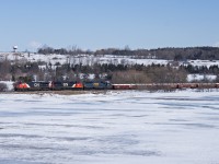 305 traverses through Port Hope with a southern visitor in the form of CSXT 8570.