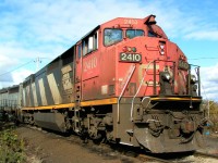 CN #2410 a GE Dash 8-40CM leading train 451 is tied up on the wye track in the CN yard. 