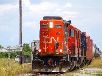 An SOR Extra from Brantford consisting of CN 7076, CN 7068 and RLK 1755 passing through Hagersville with 46 cars