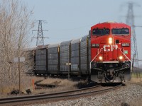 GEVO 8875 makes a powerful appearance around the curve headed West towards Tilbury in what can be an excellent location if you can get the lighting just right.  A keen eyed observer will notice a little red winged black bird trying to steal our attention as it dodges across the tracks.