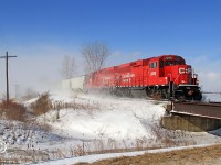 Running a little behind normal because of a broken rail at mile 83.64, CP 2259 with 2263 hustle train T29 eastward at mile 76.06 on the CP's Windsor Sub.