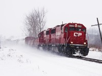 A pair of SD60's pull 142 through Cherrywood.