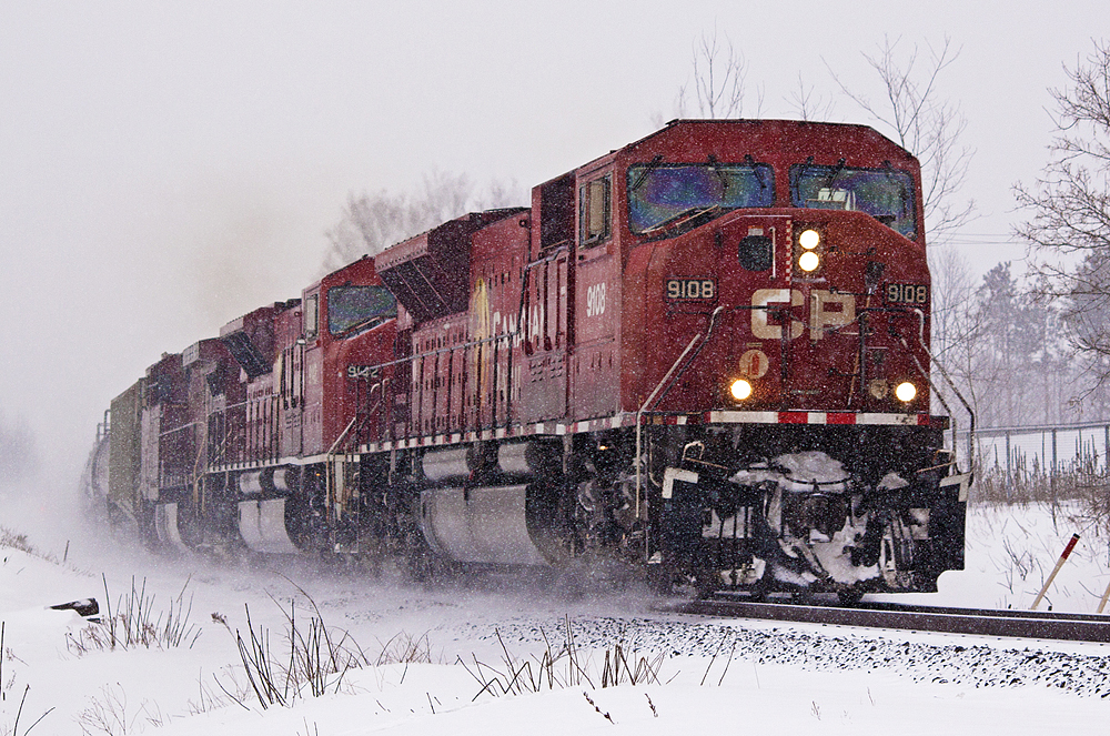 A pair of reactivated MAC's and a GE scream north through Snow Valley as they approach Midhurst. Thanks for the heads up, Roland.