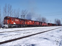 A trio of C424s and a pair of SW1200RS' depart Toronto Yard for points west, on a crisp February day.