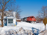 Passing through the quiet town of Inglewood, 8249's diecast K3LR2 pierces the air warning of the trains approach to the near by grade crossing up ahead. CP 8249, a GP9u is now a dying breed, not many of these units left in class one service as more and more each day fall victim to retirement and the ever so dominant GP20C-ECO's. 