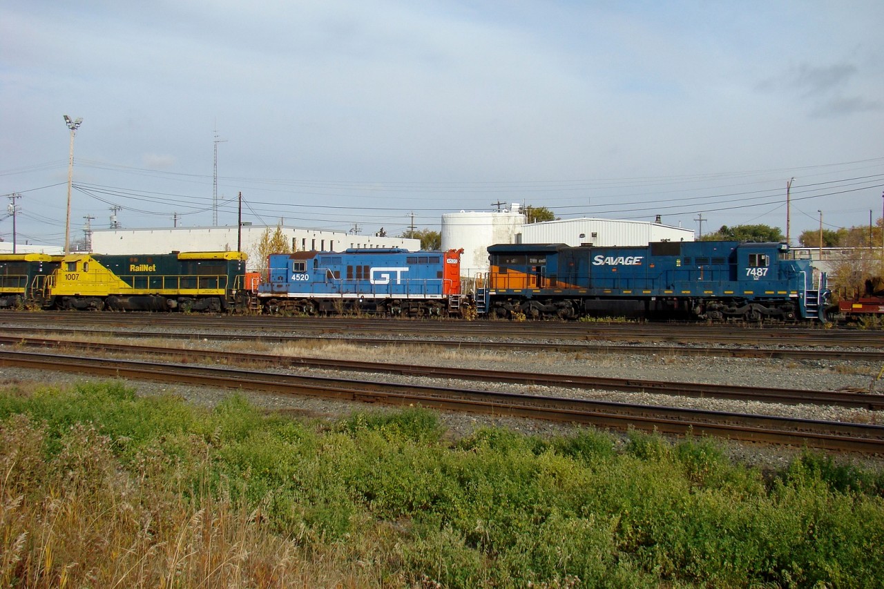 SAR C39-8 7487, GTW GP9 4520, and ARN B30-7 1007 parked in the deadline at CN's Walker Yard.